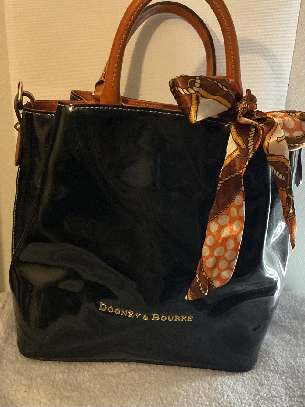 Dooney & Bourke Black Patent Leather Tote with Brown Trim and Orange Scarf